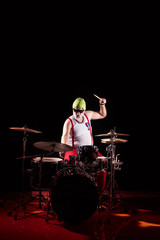 Fototapeta na wymiar Drummer playing on drum set