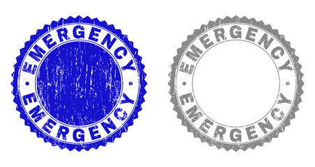 Grunge EMERGENCY stamp seals isolated on a white background. Rosette seals with distress texture in blue and gray colors. Vector rubber overlay of EMERGENCY tag inside round rosette.