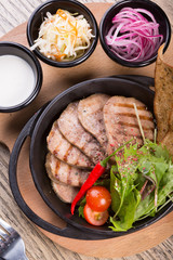 Fired beef tongue served with chili pepper