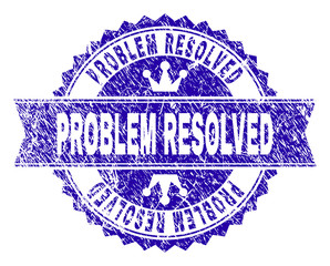 PROBLEM RESOLVED rosette stamp seal watermark with grunge texture. Designed with round rosette, ribbon and small crowns. Blue vector rubber watermark of PROBLEM RESOLVED title with dust texture.