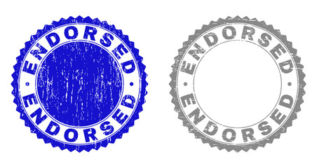 Grunge ENDORSED stamp seals isolated on a white background. Rosette seals with grunge texture in blue and gray colors. Vector rubber stamp imitation of ENDORSED caption inside round rosette.