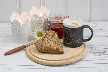 Hearty breakfast scene with mug and german Text for you on mug