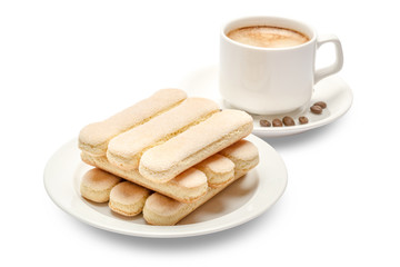 White ceramic cup of coffee with a savoiardi ladyfinger cookie on a plate