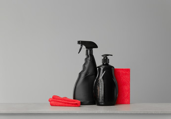 Red and black set of tools and tools for cleaning the kitchen. Neutral background.Copy space.