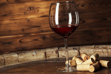 Glass of Wine on The Wooden Table