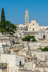 Obraz premium Sassi of Matera. Sasso Caveoso at sunset. Magic of cave houses. UNESCO World Heritage Site.