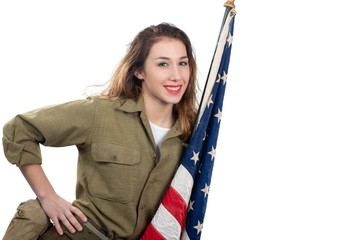 pretty young woman in wwii uniform us with american flag
