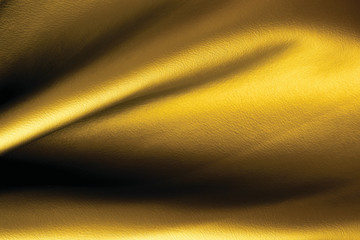 Golden leather fabric is a beautiful wave, abstract background texture ,Elegant worthy for...