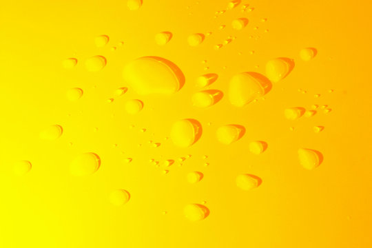 Color Water spill on yellow background