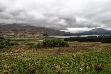 Dark clouds and countryside, Scotland
