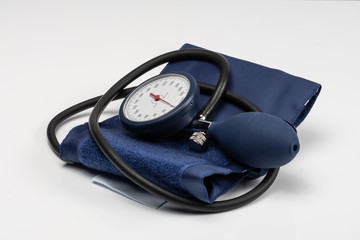 Manual blood pressure sphygmomanometer isolated on white background