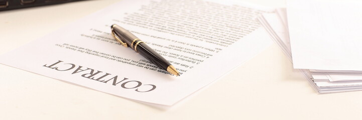 signed contract on the desktop. business background