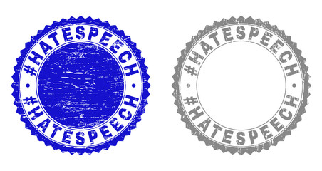 Grunge #HATESPEECH stamp seals isolated on a white background. Rosette seals with grunge texture in blue and gray colors. Vector rubber stamp imitation of #HATESPEECH tag inside round rosette.