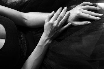 Beautiful hands. The hands of a ballerina with pronounced veins. Chest of ballerina.