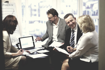 successful business partners discussing a new contract