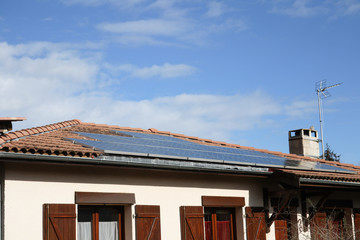 photovoltaic solar panel on the roof of a house