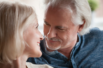 Close up portrait aged couple in love