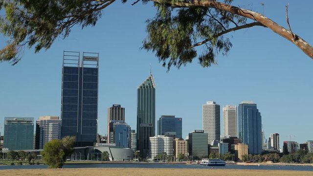 Boat tour in front of Perth skyline and beach, Australia