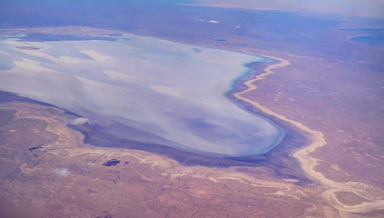 Fototapeta premium Aerial Panorama view to saline Barsa Kelmes lake and Ustyurt plateau at Karakalpakstan, Uzbekistan