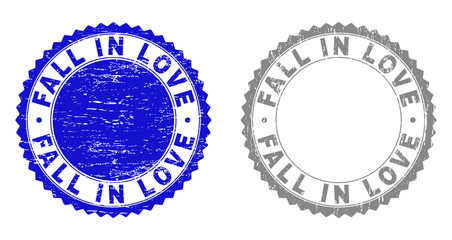 Grunge FALL IN LOVE stamp seals isolated on a white background. Rosette seals with grunge texture in blue and gray colors. Vector rubber overlay of FALL IN LOVE title inside round rosette.