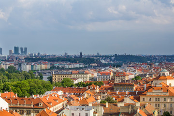 Fototapeta na wymiar View of Prague from the tower of the Cathedral of St. Peter. Panorama of Prague. Architecture of Prague old town