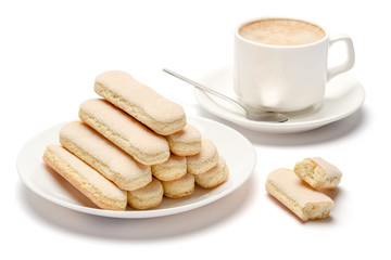 White ceramic cup of coffee with a savoiardi ladyfinger cookie on a plate