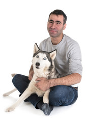 siberian husky and man