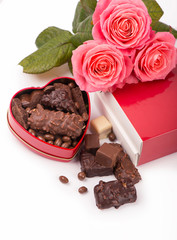 rose and dark chocolate for valentine day on isolate white background.