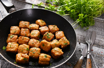 Small meat squares from the pan