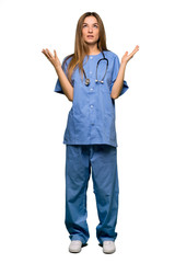 Full body Young nurse frustrated by a bad situation on isolated background