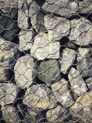 Stones and wire for the wall