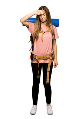 Full body Young backpacker woman with tired and sick expression on isolated background