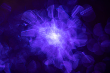 illuminated burst of blue light. lens flare shine effects. creative background