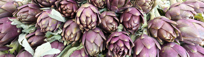 background of green ripe artichokes