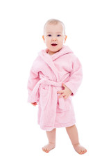 cute baby girl in pink bathrobe after bath posing isolated on white