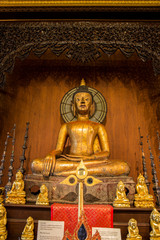 Antique Wooden Buddha Sculpture at Wat Phra Kaeo - Chiang Rai, Thailand