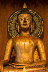 Antique Wooden Buddha Sculpture at Wat Phra Kaeo - Chiang Rai, Thailand