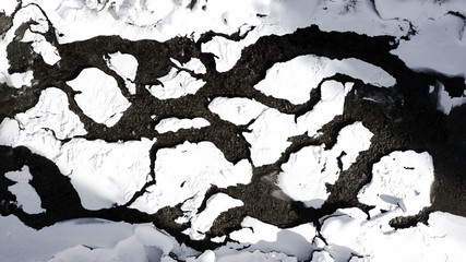 snow covered river delta aerial in 4k
