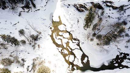 snow covered river delta aerial in 4k