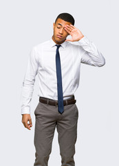 Young afro american businessman with tired and sick expression on isolated background