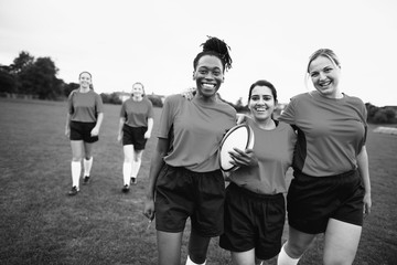 Obraz premium Energetic female rugby players walking together
