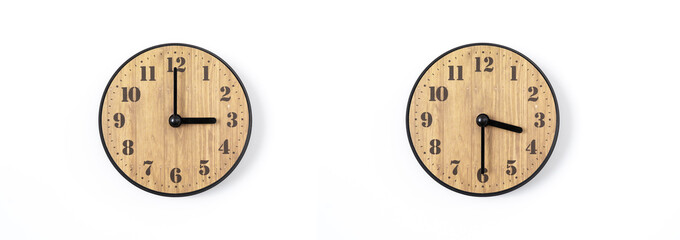 wood office wall clock with white dial on white background. wall clock on white background, top view.