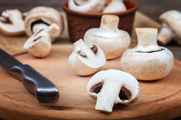 Fresh fruits of mushrooms on a wooden board