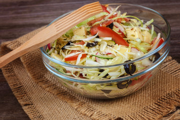 Fresh vegetables and vegetable salad in dishes