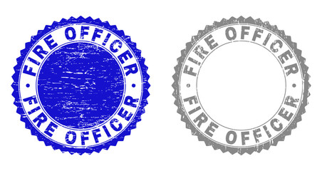 Grunge FIRE OFFICER stamp seals isolated on a white background. Rosette seals with grunge texture in blue and gray colors. Vector rubber stamp imitation of FIRE OFFICER label inside round rosette.