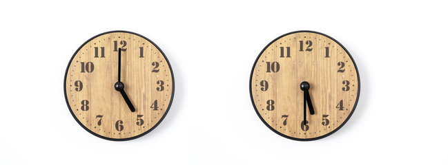 wood office wall clock with white dial on white background. wall clock on white background, top view.