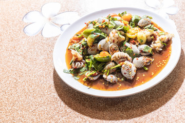 Som Tum, Papaya salad shellfish blood cockles and squid.