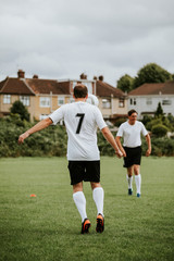 Male football players on a football pitch