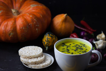 Pumpkin asian coconat cream soup. Autumn hot food