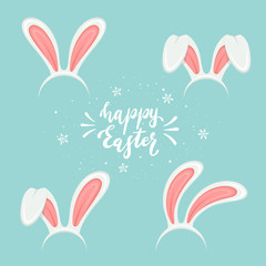 Lettering Happy Easter on Blue Background and Rabbit Ears